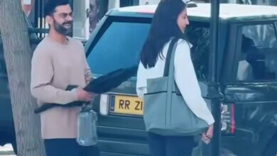 काली छाता और हाथ में पानी की बोतल, विराट -नुश्का लंदन की सड़कों पर घूमते हुए, वीडियो - AAJTAK